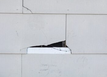 Replacement Asbestos Siding Tiles - If needed, lift the siding with the.