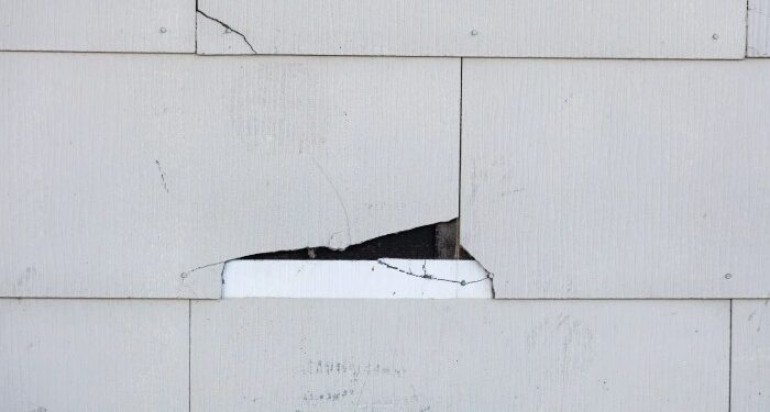 Replacement Asbestos Siding Tiles - If needed, lift the siding with the.